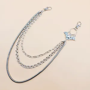 Punk style multi-layer metal pants chain with bat pendant, hip hop waist chain detail.