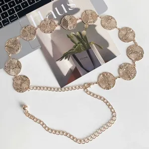 Gold metal coin waist chain for women, fashion hollow disc body chain jewelry accessory.