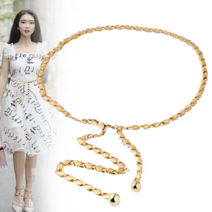 Gold metal chain belt for women, punk style minimalist waist chain body jewelry detail.