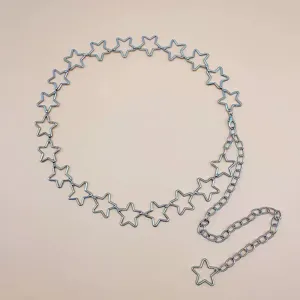 Detailed view of a trendy silver star metal waist chain, perfect edgy body jewelry.