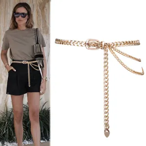 Punk metal chain waist belt for women, multi-layer golden dress body chain accessory.