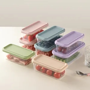 Colorful silicone food storage containers set, clear plastic lunch boxes with pastel lids.
