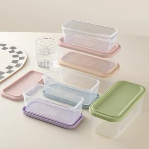 Clear food storage containers set with colorful silicone lids for meal prep and kitchen organization.