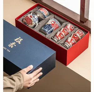 Premium ceramic kung fu tea set with teapot and cups in a luxury gift box for home and guests.