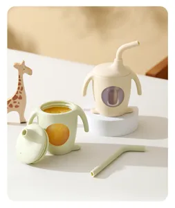 Kinder Silikon Trinkbecher Baby Lernbecher mit Griffen und niedlichem Pinguin Design Details.