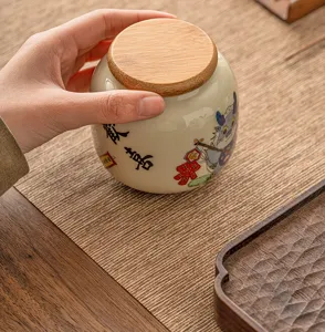Boîte à thé en céramique avec couvercle en bois, joli dragon et caractères chinois pour la maison.