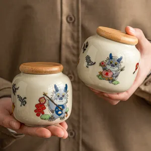 Boîte à thé en céramique portable avec couvercle en bois, petit pot hermétique pour le ménage.