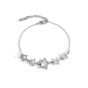 Silver star rhinestone bracelet detail, delicate hollow star charms, adjustable chain link.