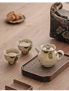 Hand-painted ceramic tea cup with cute rabbit and floral design for gongfu tea tasting set.