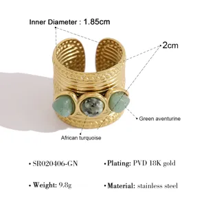 Detail view of a French vintage wide open ring with natural stones and PVD 18K gold plating.
