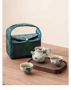 Juego de té kung fu de cerámica pintada a mano con tetera, dos tazas y bolsa