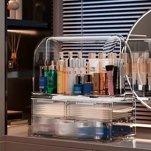 Caja organizadora de maquillaje de acrílico transparente con tapa antipolvo y cajones.