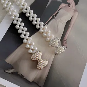 Elegant pearl waist chain with rhinestone bow, stretch belt for dresses detail photo.