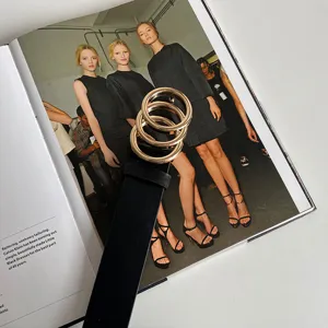 Women fashion black leather belt with gold triple ring buckle minimalist waist accessory detail