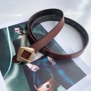 Stylish women brown leather belt with chic diamond metal buckle casual jeans belt accessory.