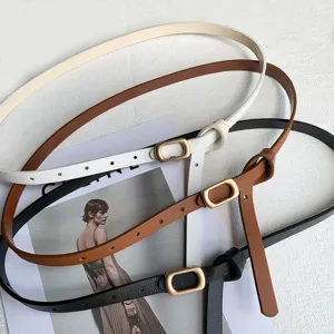 Minimalist women's slim leather belt set featuring classic black, brown, and white colors.