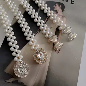 Elegant pearl waist belt with rhinestone buckle, stretch elastic dress chain for women.