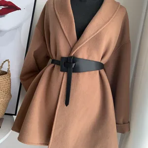 Black faux leather waist belt for women, stylish knot design coat cincher accessory detail.