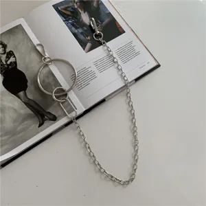 Punk style silver metal chain waist belt accessory with multi-rings and clasps for dress styling.