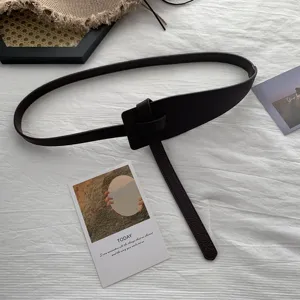 Stylish dark brown leather knot belt for women, minimalist waist accessory for coats.