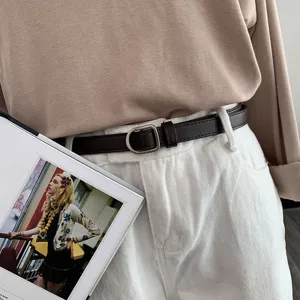 Slim brown leather belt detail shot with metal buckle, versatile casual accessory for daily wear.