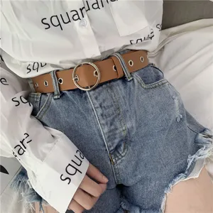 Fashion women metal round buckle leather belt detail view showcasing stylish casual design elements.