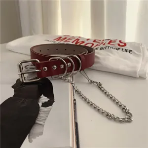 Punk style dark red leather belt with silver metal chain, perfect for casual jeans and vintage outfits.