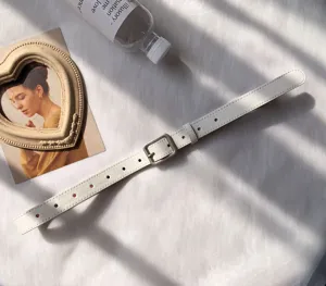White leather belt for women vintage pin buckle detail showcasing elegant aesthetic design.