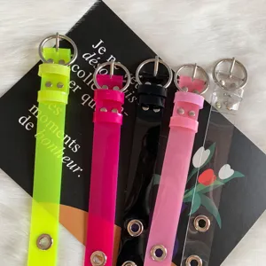 Colorful transparent PVC jelly belt for women with metal round buckle and eyelets.