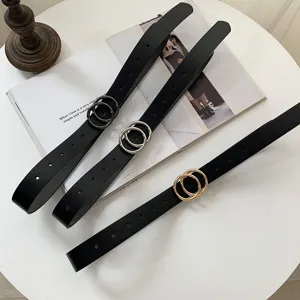 Vintage double ring black leather belt, casual waist strap for jeans and pants, minimalist design.