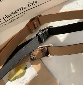 Vintage unisex leather belt with metal buckle, stylish retro design for daily casual wear.