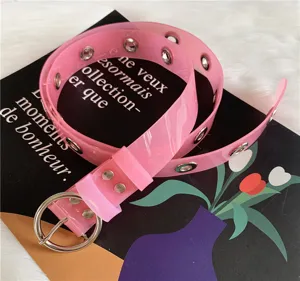 Pink transparent PVC belt for women with metal eyelets and round buckle for casual fashion style.