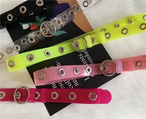 Fashion colorful transparent PVC belt with metal round buckle and eyelets for women.
