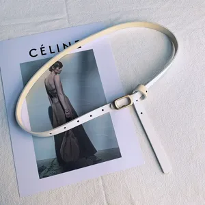 Minimalist white thin leather belt for women, elegant gold buckle dress waist belt for daily wear.