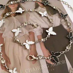 Fashion silver metal body chain belt with black white butterfly rhinestones, waist chain detail view
