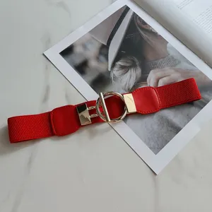 Red elastic waist belt for women with gold metal ring buckle, stylish wide stretch belt for dress.