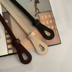 Ceinture fine en cuir minimaliste pour femmes, accessoire de taille élégant pour robes.
