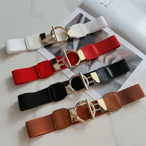 Stylish women's wide elastic waist belt with metal interlock buckle for sweater and dress.