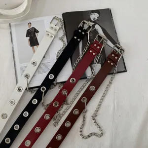 Women punk style leather belt with metal eyelets and decorative chains, multi-color detail.