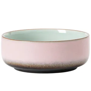 Keramische theewasschaal met roze verloopglazuur en lichtgroene binnenkant voor theeaccessoires.