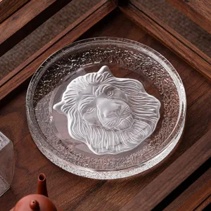 Kristallglas Teekannenmatte mit mattiertem Löwenkopf-Design, hitzebeständiger Untersetzer.
