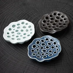 Ceramic lotus seedpod teapot stand for tea ceremony, traditional Kung Fu tea tray.