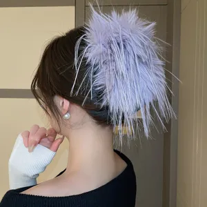 Molla per capelli retrò con piume e nappe da donna, elegante accessorio fermaglio per capelli.