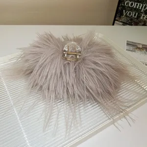 Molla per capelli con piume soffici rétro da donna, elegante accessorio per lo styling quotidiano.