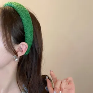 Cerchietto intrecciato testurizzato verde da donna moda corona alta capelli autunno inverno
