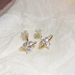 Exquisite heart pearl orb stud earrings with sparkling crystals for stylish daily wear.