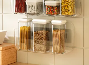 Transparent wall-mounted storage box organizer container with lid for home bathroom decor.