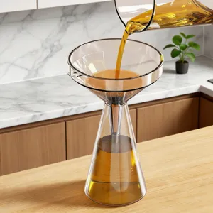 Transparent glass funnel set for kitchen oil and liquid decanting, modern minimalist design.