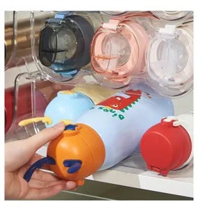 Clear stackable water bottle storage organizer multi-layer rack for home kitchen fridge.