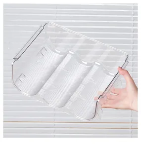 Clear plastic stackable bottle holder detail view, perfect for refrigerator beverage.